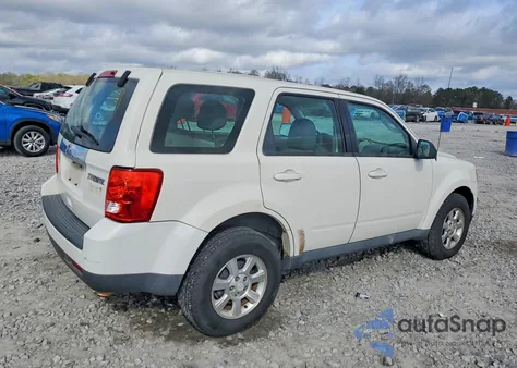2010 Mazda Tribute I z USA, uszkodzony, nr VIN 4F2CY0C78AKM02806